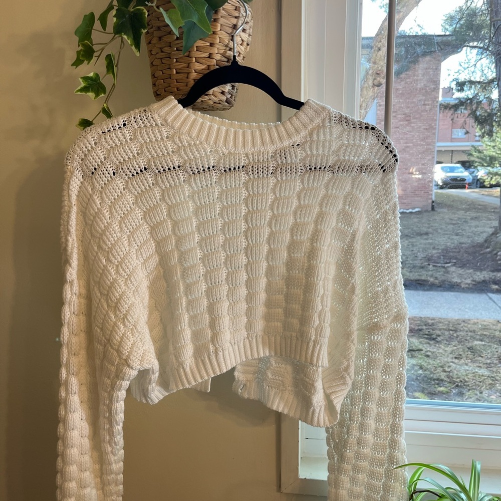 Cropped white knit sweater